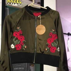 green jacket with flowers
